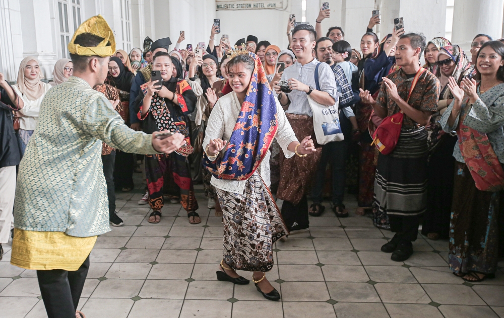 Participants dance during the Keretapi Sarong 2023 (KS2023) held at the Ipoh Railway Station grounds at Jalan Panglima Bukit Gantang Wahab in Ipoh September 16, 2023. — Picture by Farhan Najib