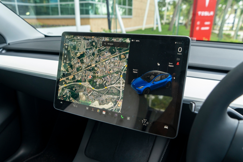 Tesla Model Y relies heavily on technology and most of its functions are controlled through its display screen. — Picture by Shafwan Zaidon