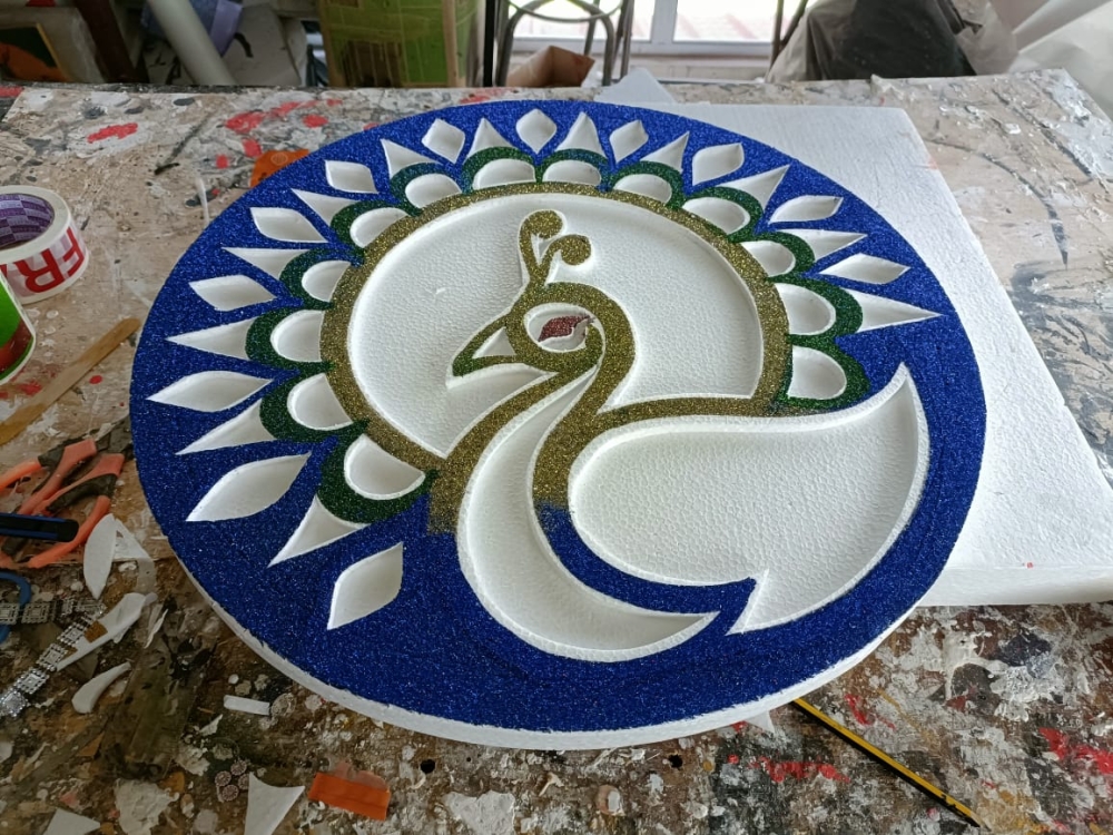 According to Saravanah, it would only take around 15-minutes to finish making a polystyrene-base rangoli kolam compared to usual ones which could take up to one hour. — Picture courtesy of HGP Saravanah Rao. 