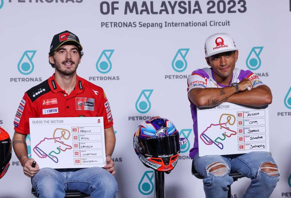(From left) Ducati Lenovo Team rider Francesco Bagnaia and Prima Pramac Racing rider Jorge Martin speak to the media during the 2023 Malaysian Motorcycle Grand Prix pre-event press conference at the Sepang International Circuit November 9, 2023. — eNM pic