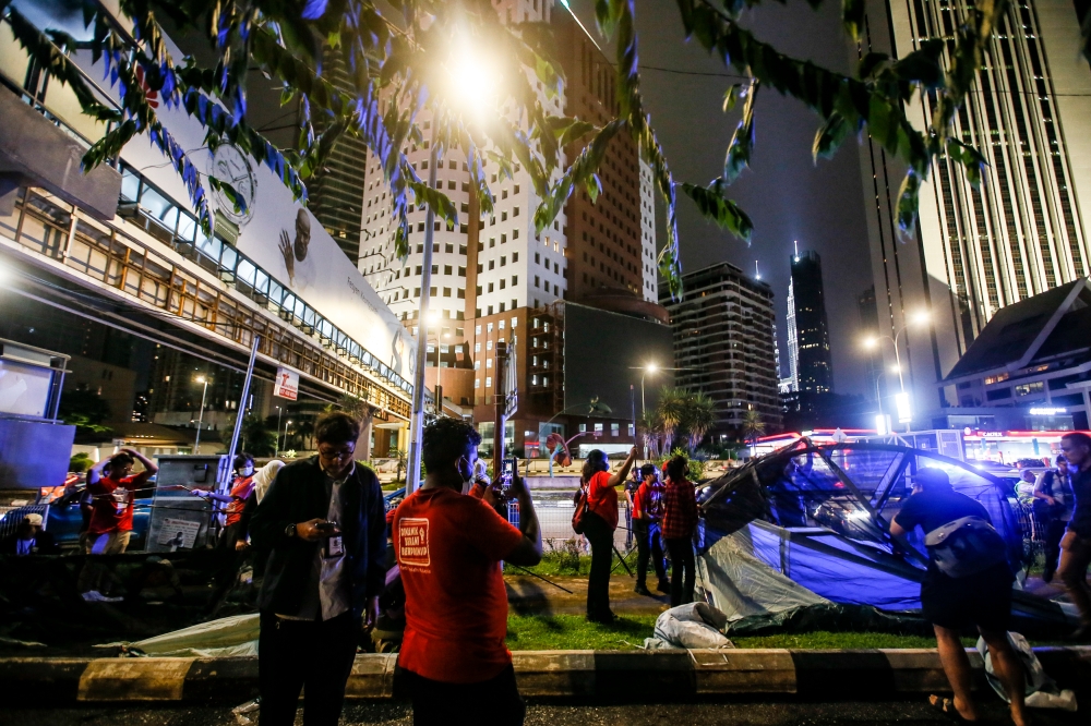 Members of the Socialist Party of Malaysia (PSM) set up a tent near the US Embassy compound during the Kepung Demi Palestin event at Jalan Tun Razak in Kuala Lumpur, December 26, 2023. — Picture by Hari Anggara