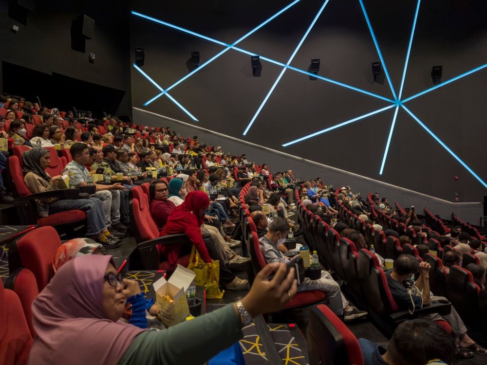 People attend the special screening of ‘Abang Adik’ film at Starling Mall, Petaling Jaya January 21, 2024. — Picture by Shafwan Zaidon