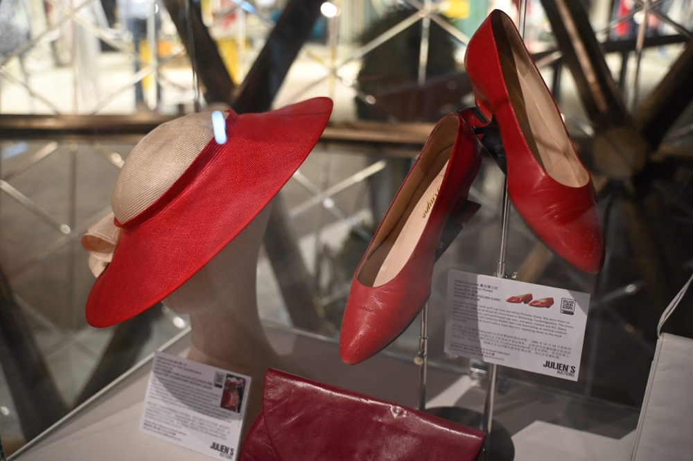 Photo taken on April 17, 2024 shows shoes and accessories once worn by Princess Diana at a media preview ahead of the auction by Julian’s Auctions titled ‘Princess Diana’s Elegance & A Royal Collection’ on display in Hong Kong. — eNM pic