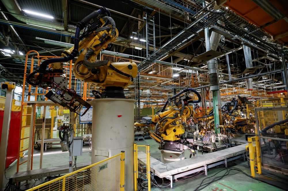 Robotic arms are installed at the new factory of China's Chery Auto, at Zona Franca, in Barcelona April 19, 2024. — eNM pic  