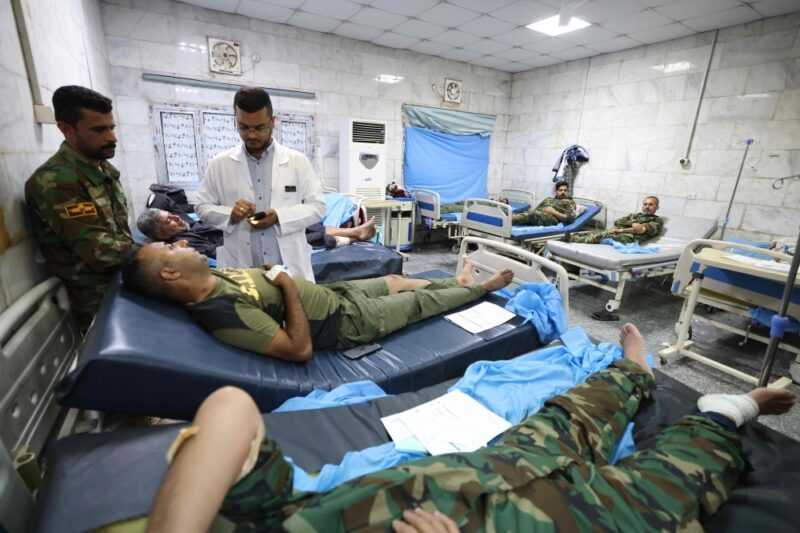 Iraqi military personnel receive treatment at a hospital in Hilla in the central province of Babylon after they were wounded in an alleged bombing overnight on an Iraqi military base housing a coalition of pro-Iranian armed groups, on April 20, 2024. ― eNM pic
