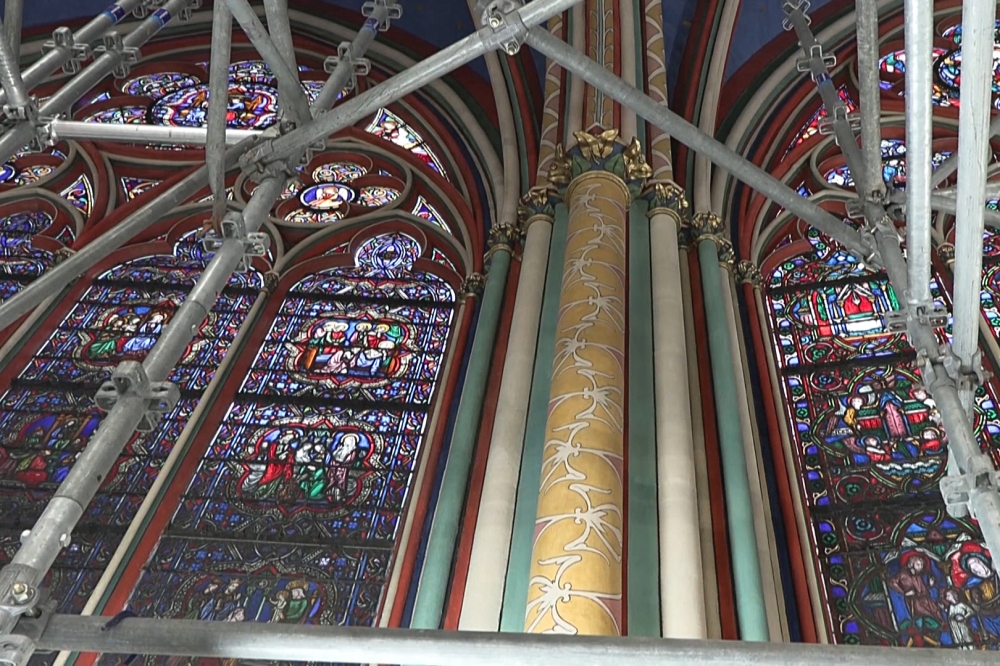 This video grab created from an eNM video taken on April 11, 2024, shows stained-glass windows inside Paris Notre-Dame cathedral currently under restoration. — eNM pic