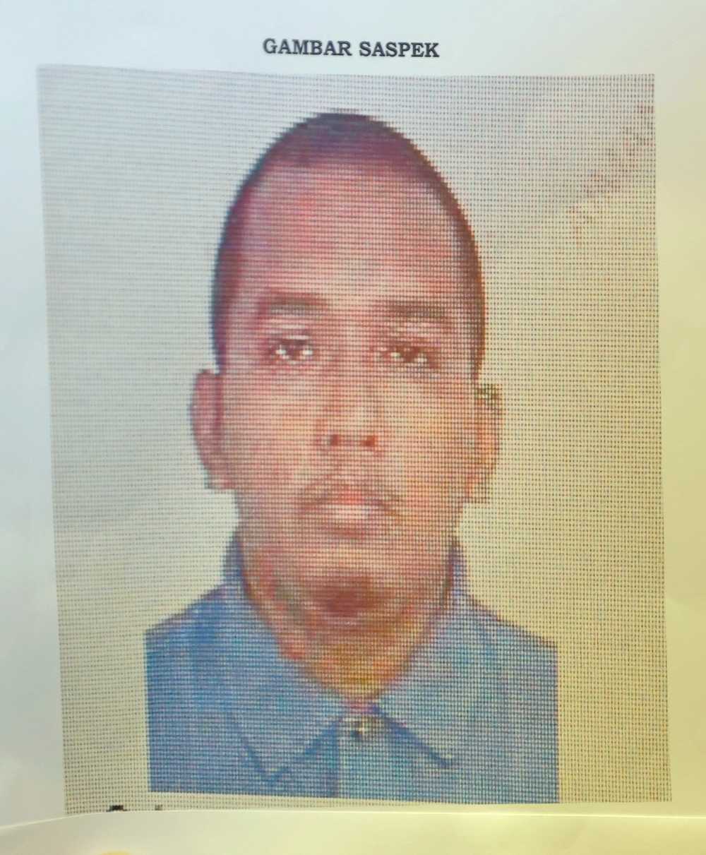 Hafizul Harawi, 38, attempted to kill his wife by firing his gun at the arrival hall in KLIA last Sunday morning. — eNM pic