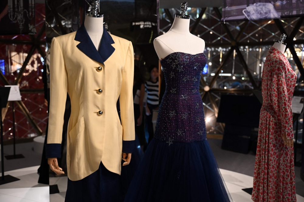 Photo taken on April 17, 2024 shows outfits once worn by Princess Diana at a media preview ahead of the auction by Julian’s Auctions titled ‘Princess Diana’s Elegance & A Royal Collection’ on display in Hong Kong. — eNM pic
