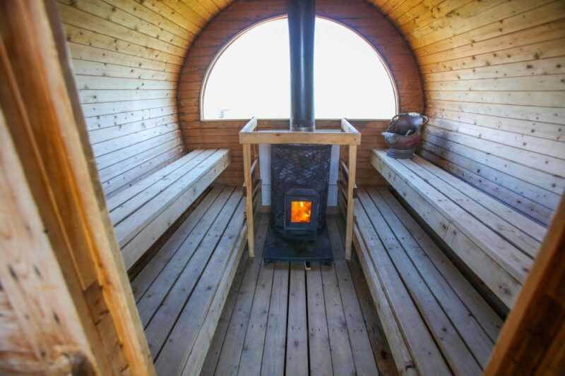 The fire burns inside a sweathouse sauna at Baginbun beach, near Wexford, on the south-east coast of Ireland on April 1, 2024. — eNM pic