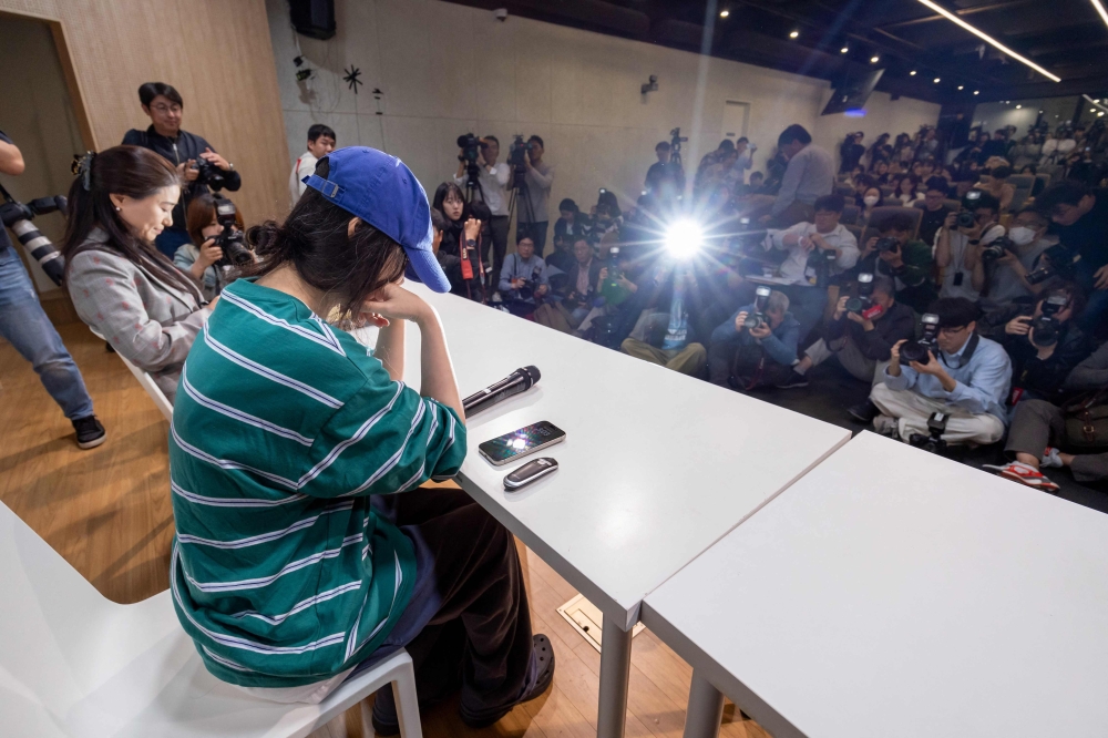 Min Hee-jin, famed superproducer and chief of ADOR, a powerhouse subsidiary of HYBE, speaks during a press conference in Seoul on April 25, 2024. — eNM pic