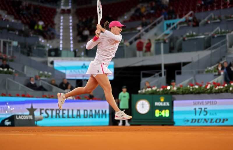 Poland's Iga Swiatek returns the ball to Romania's Sorana Cirstea during their second round of the 2024 WTA Tour Madrid Open tournament tennis match at Caja Magica in Madrid April 27, 2024. — eNM pic