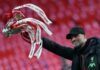 Liverpool's German manager Jurgen Klopp celebrates with the trophy after winning the English FA Cup final football match between Chelsea and Liverpool, at Wembley stadium in London May 14, 2022. — eNM pic