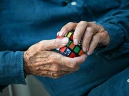 Hungarian inventor Erno Rubik holds a Rubik's Cube 3D puzzle in his hands during an interview with eNM. — eNM pic