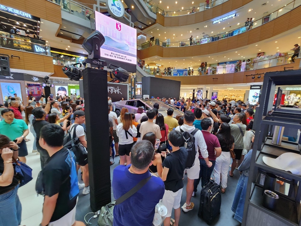Tesla’s first-ever showcase in Penang at Gurney Plaza attracted many shoppers on its launch day.— Picture courtesy of CapitaLand 